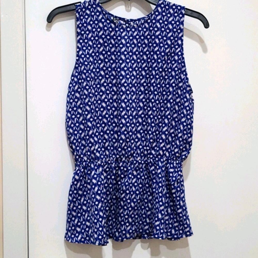🆕️Women's sleeveless peplum top- Medium